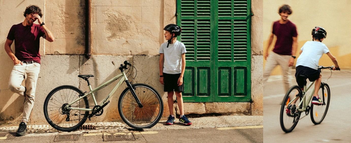 Puky Vater mit Kind und Fahrrad